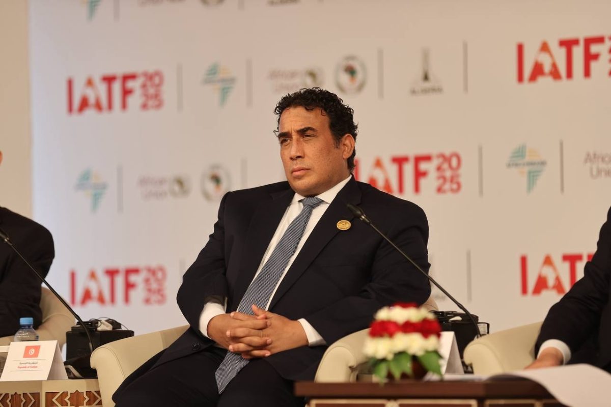 رئيس المجلس الرئاسي الليبي محمد المنفي خلال كلمته في معرض IATF 2025 بالجزائر العاصمة